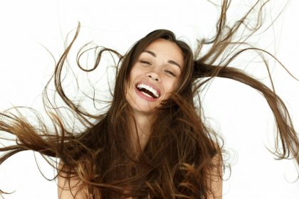 beautiful-woman-shakes-her-hair-white-background_8353-1698